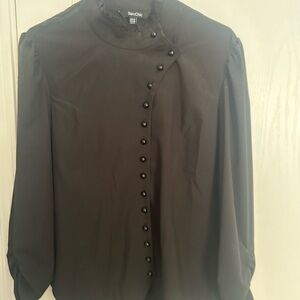 Black fancy shirt for a steam punk costume.
